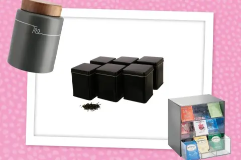 Graue Tee Aufbewahrung Dose mit Holzdeckel, sechs schwarze Tee Dosen und ein Organizer für Teebeutel.
