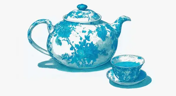 Blau-weiße Teekanne und Tasse mit floralem Muster. Die Epigallocatechingallat-Wirkung von grünem Tee ist bekannt für seine antioxidativen Eigenschaften.